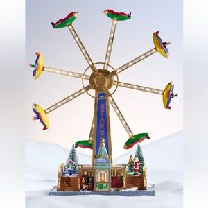 St. Nicholas Square spinning carnival ride illuminated hand painted music motion